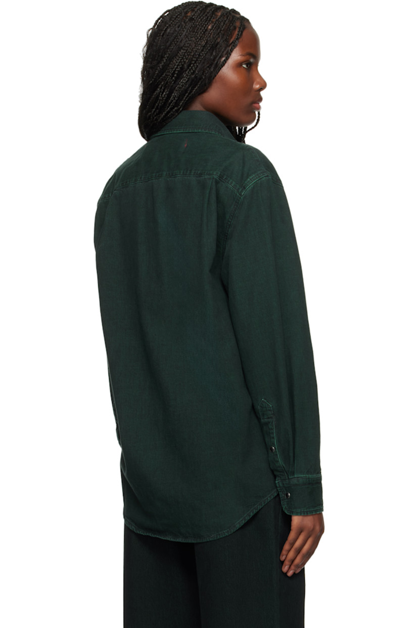 Overdyed non-stretch organic cotton denim shirt.

· Spread collar
· Press-stud closure
· Logo embroidered at front
· Shirttail hem
· Dropped shoulders
· Press-stud barrel cuffs
· Box pleat at back yoke
· Mother-of-pearl hardware

Supplier color: Overdyed sea green