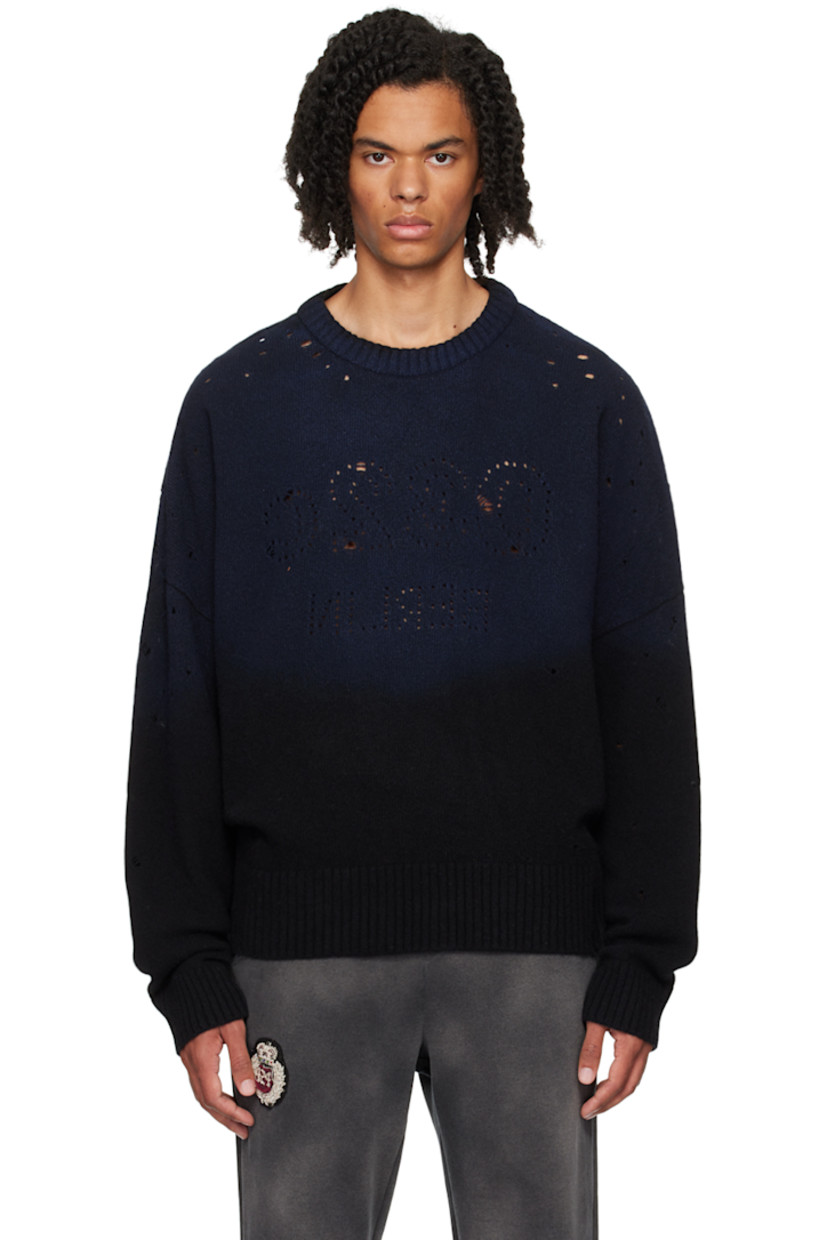 Knit garment-dyed merino wool sweater. Distressing throughout.

· Rib knit crewneck, hem, and cuffs
· Perforated logo graphic at front

Supplier color: Black