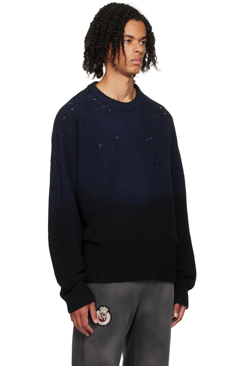 Knit garment-dyed merino wool sweater. Distressing throughout.

· Rib knit crewneck, hem, and cuffs
· Perforated logo graphic at front

Supplier color: Black