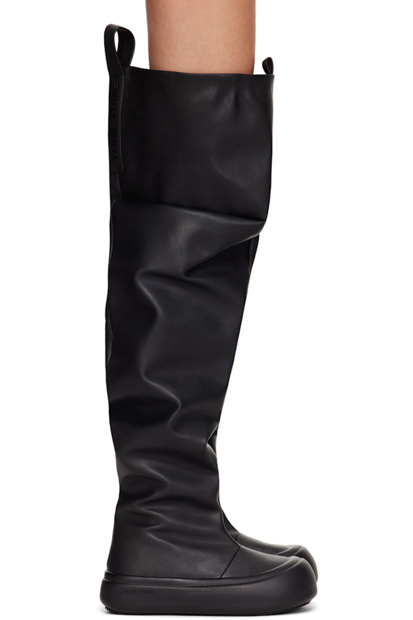 Over-the-knee buffed faux-leather slip-on boots in black. 

· Gathering throughout
· Rubber cap toe
· Logo-embossed pull-loops at collar
· Buffed faux-leather lining
· Logo embossed at outer midsole
· Treaded recycled rubber sole

Supplier color: Black