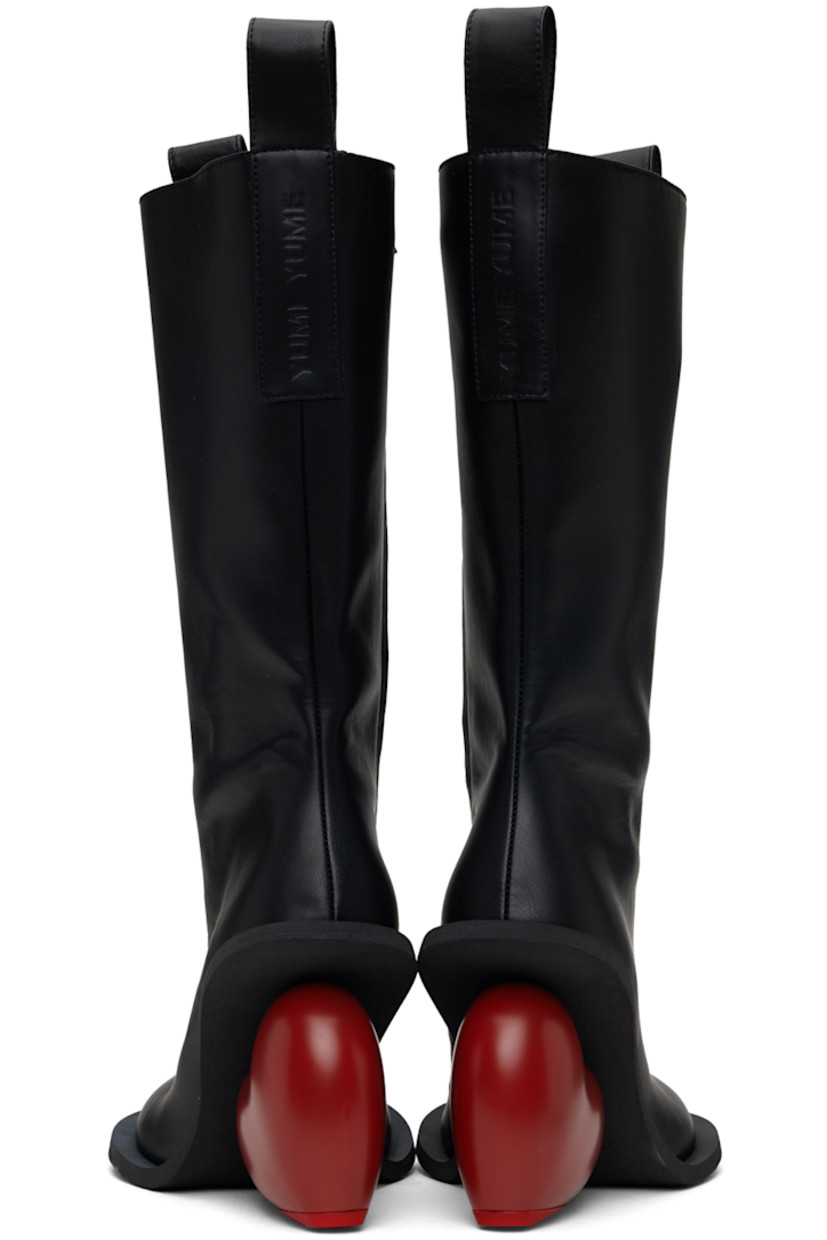 Calf-high buffed faux-leather boots in black.  

· Pull-loops at collar
· Zip closure at inner side
· Logo embossed at heel tab
· Sculptural heel with rubber injection
· Neolite foam rubber sole
· Heel: H3.75"

Supplier color: Black/Red