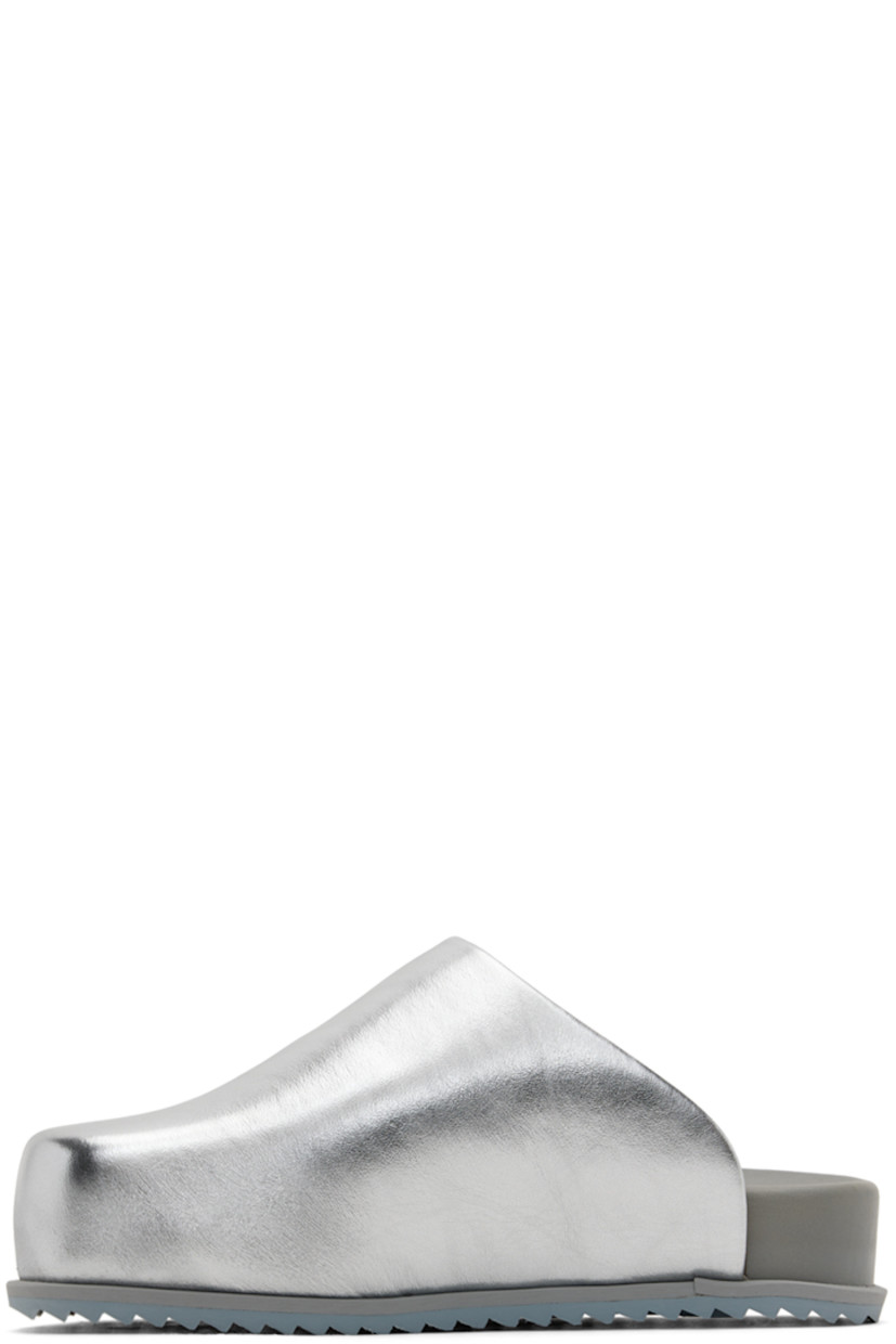 Padded buffed faux-leather slip-on loafers in metallic silver tone.

· Square toe
· Logo stamp at molded footbed
· Treaded TPU sole

Supplier color: Silver vegan leather