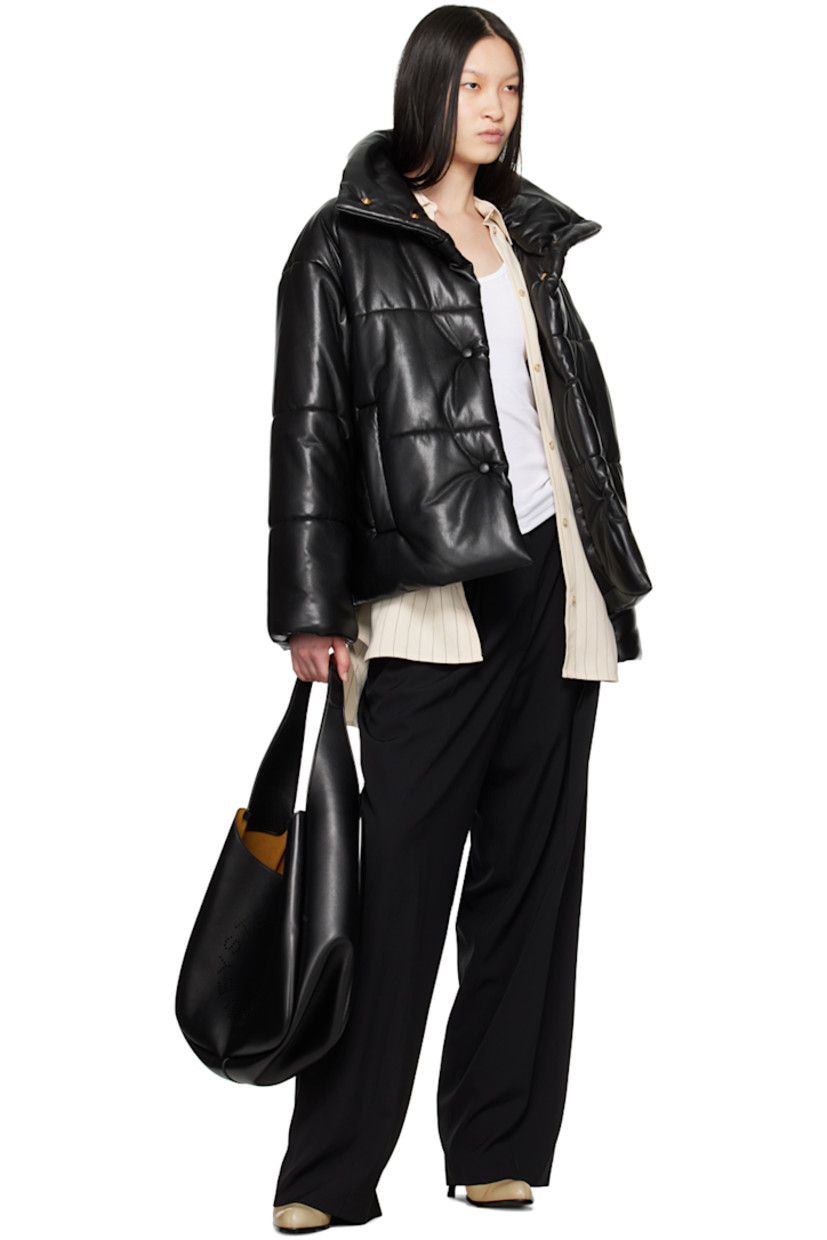 Insulated quilted grained OKOBOR™ vegan leather jacket.

· Funnel neck
· Press-stud closure
· Welt pockets
· Locker loop at back yoke
· Full viscose satin lining

Supplier color: Black