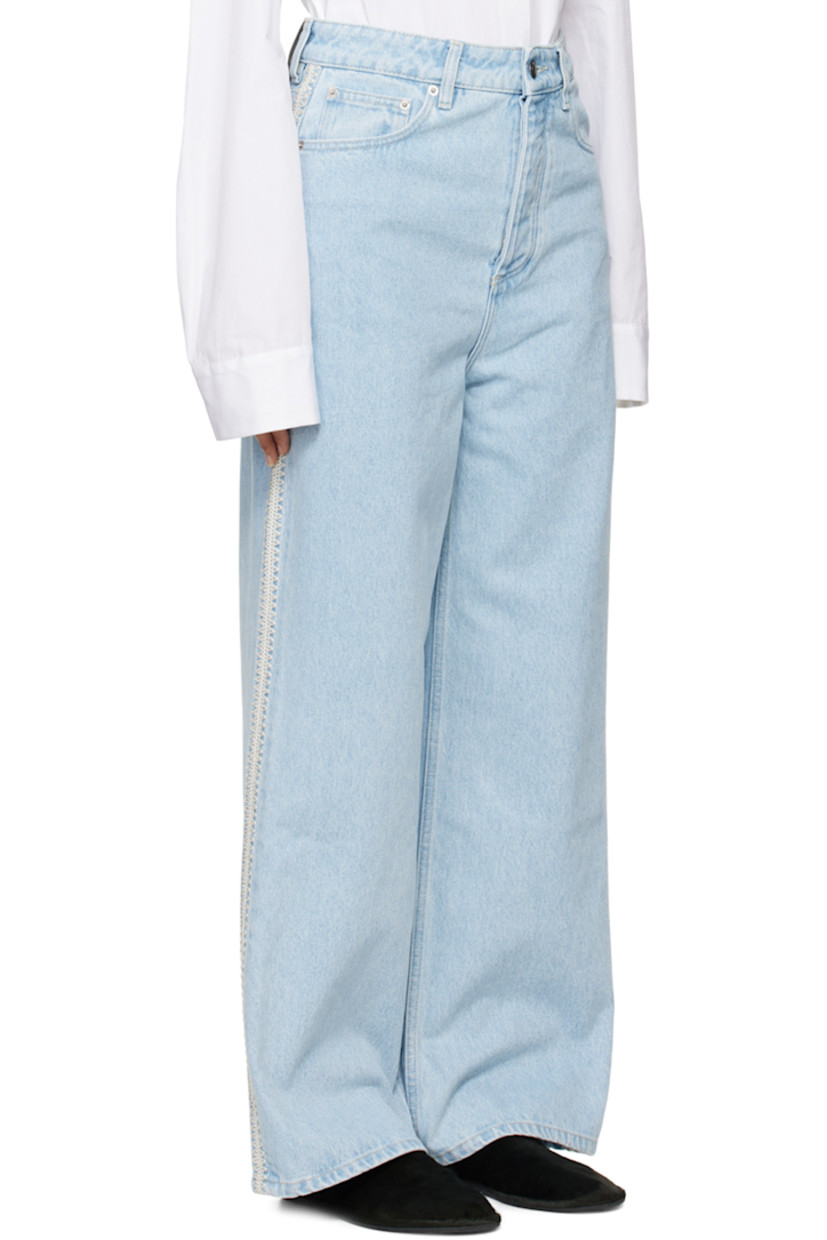 Loose-fit and wide-leg non-stretch organic cotton denim jeans. Fading throughout.

· Low-rise
· Belt loops
· Five-pocket styling
· Button-fly
· Crocheted trim at outseams
· Logo patch at back waistband 
· Logo embroidered at back pockets 
· Logo-engraved silver-tone hardware
· Contrast stitching in beige 

Supplier color: Eco bleach/Creme