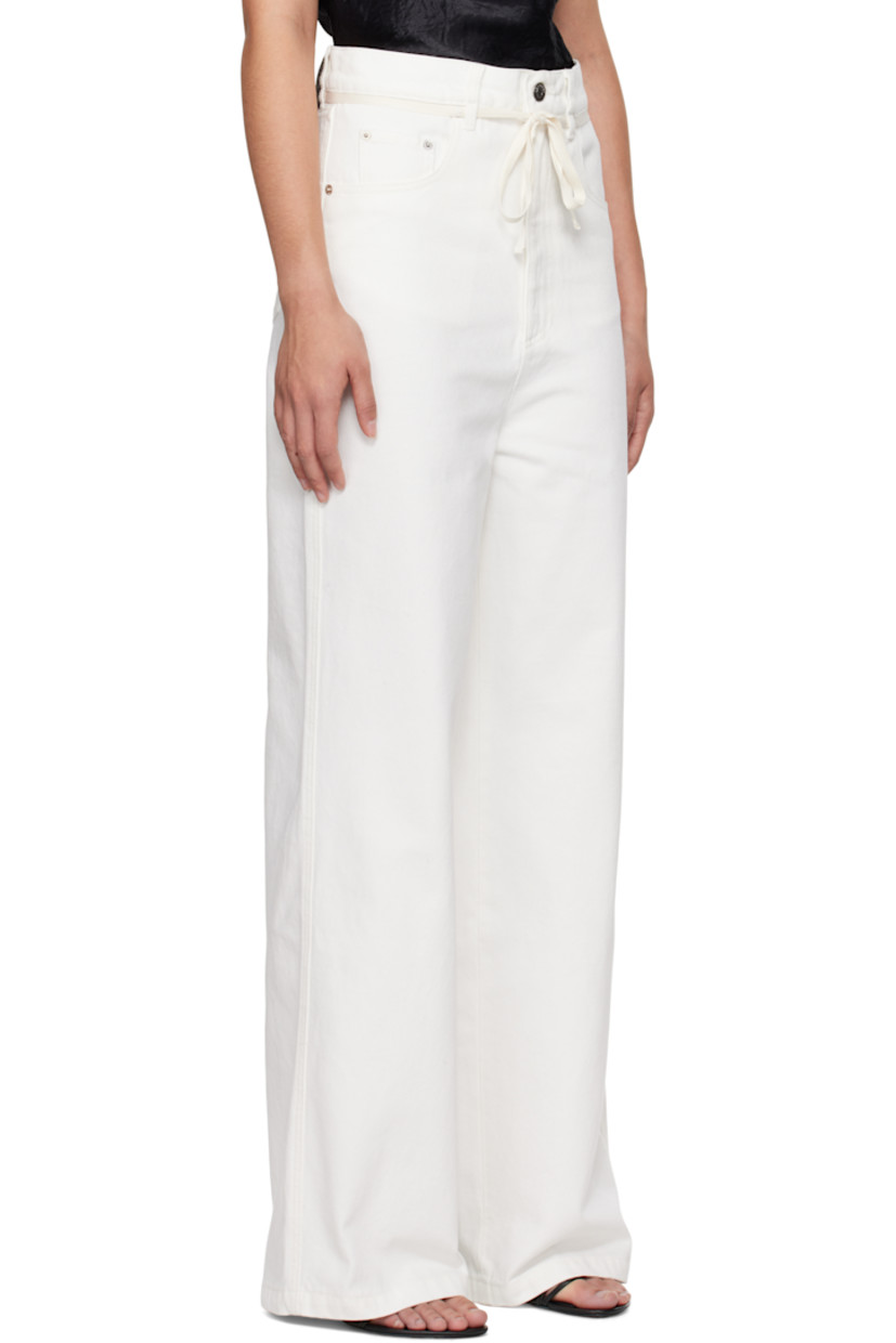 Wide-leg non-stretch denim jeans.

· Belt loops and detachable self-tie belt
· Five-pocket styling 
· Zip-fly
· Logo patch at back waistband
· Logo-engraved silver-tone hardware

Supplier color: Off white