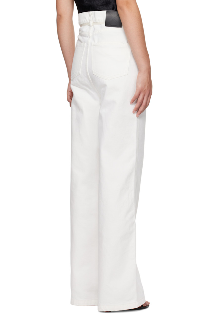 Wide-leg non-stretch denim jeans.

· Belt loops and detachable self-tie belt
· Five-pocket styling 
· Zip-fly
· Logo patch at back waistband
· Logo-engraved silver-tone hardware

Supplier color: Off white