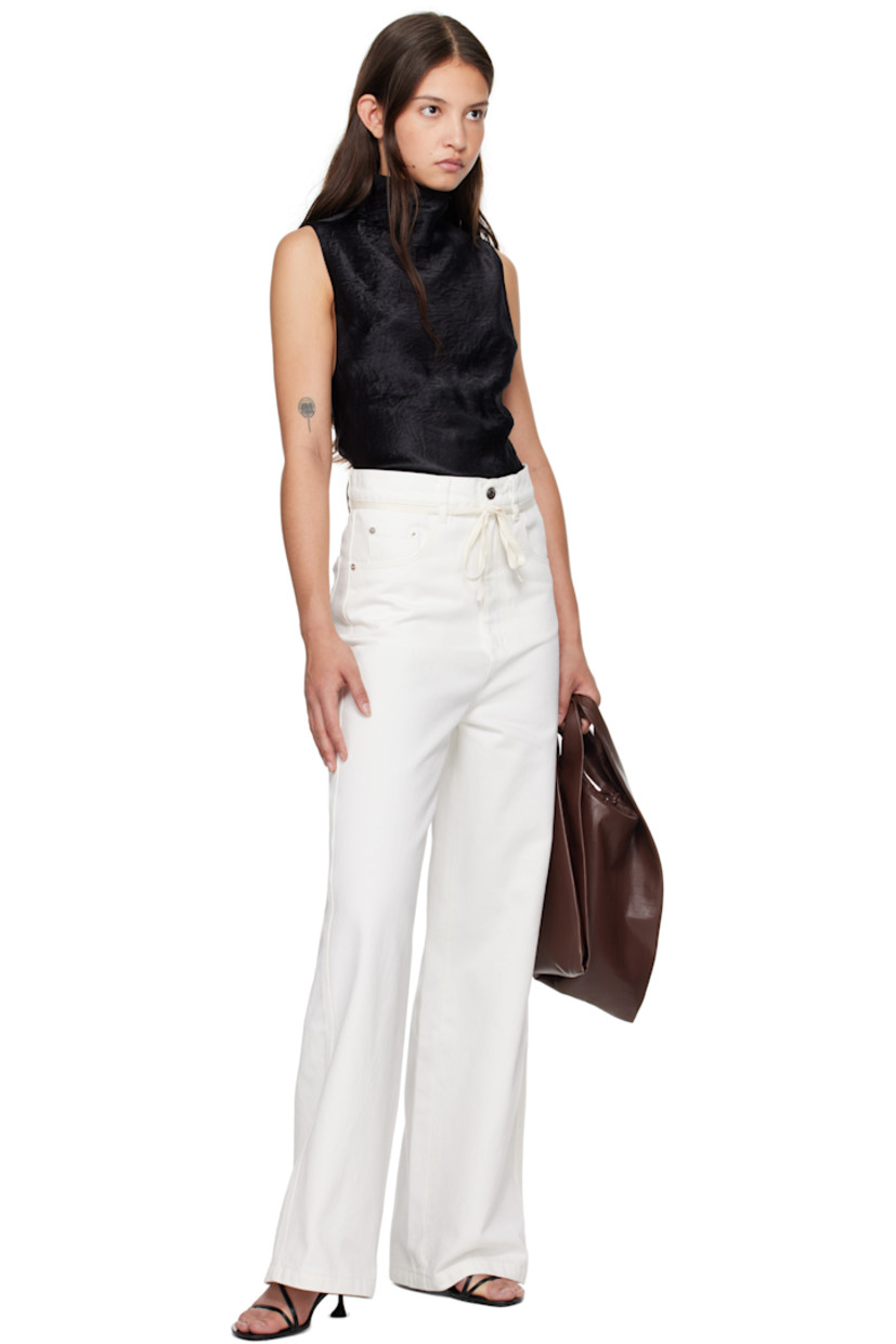 Wide-leg non-stretch denim jeans.

· Belt loops and detachable self-tie belt
· Five-pocket styling 
· Zip-fly
· Logo patch at back waistband
· Logo-engraved silver-tone hardware

Supplier color: Off white