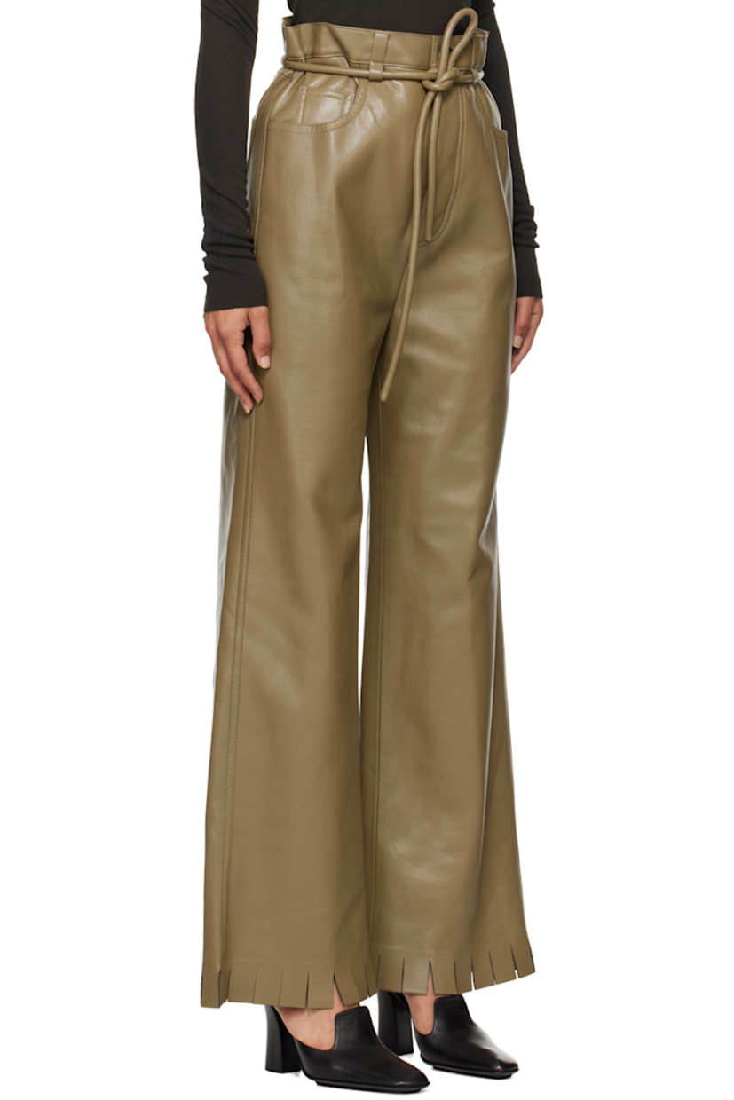 Loose-fit coated vegan leather trousers. 

· Belt loops with detachable self-tie belt 
· Five-pocket styling
· Button-fly
· Fringed detailing at cuffs 
· Faux-suede interior 

Supplier color: Muted khaki