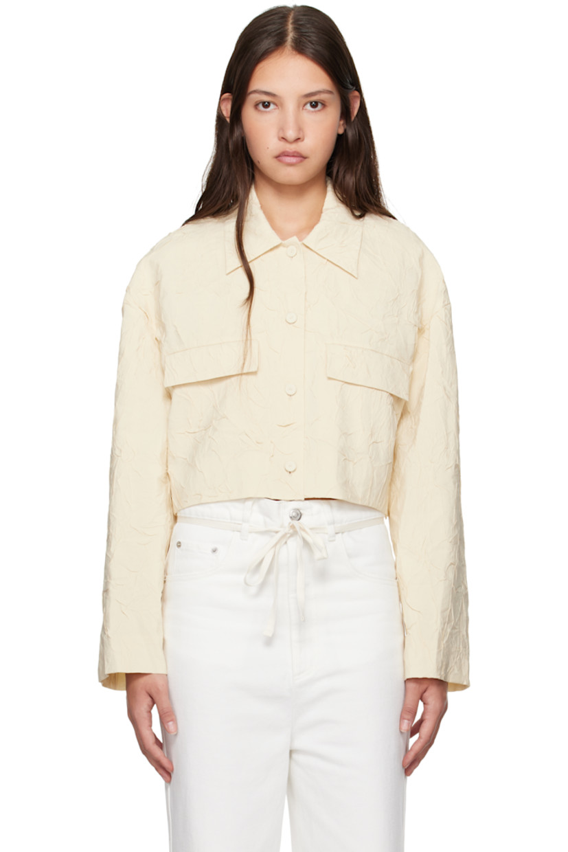 Crinkled viscose-blend poplin shirt.

· Spread collar
· Button closure
· Mock flap pockets 
· Cropped hem
· Full crepe lining

Supplier color: Oat