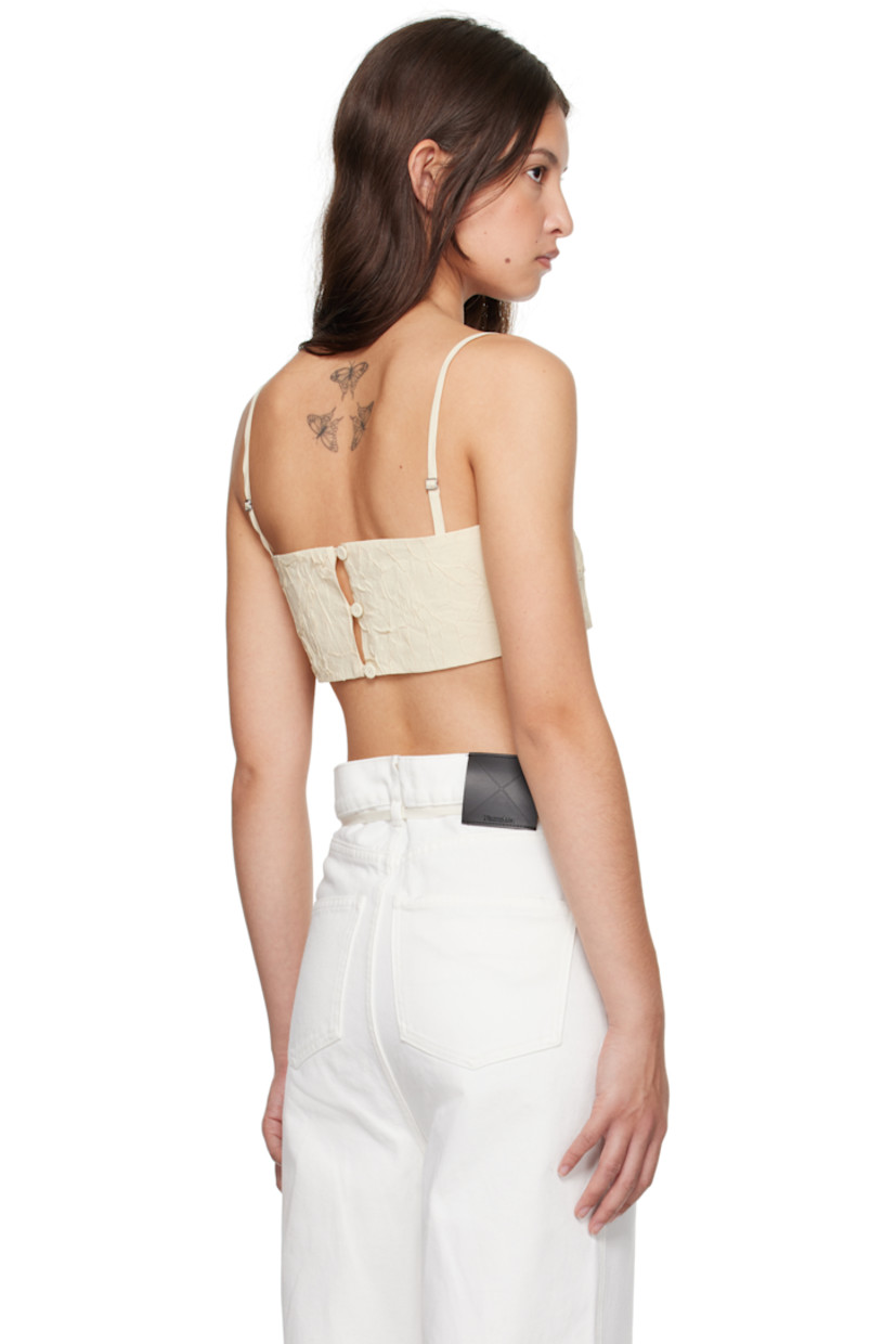 Crinkled viscose-blend poplin top.

· Straight neck
· Adjustable spaghetti shoulder straps
· Button closure at back

Supplier color: Oat