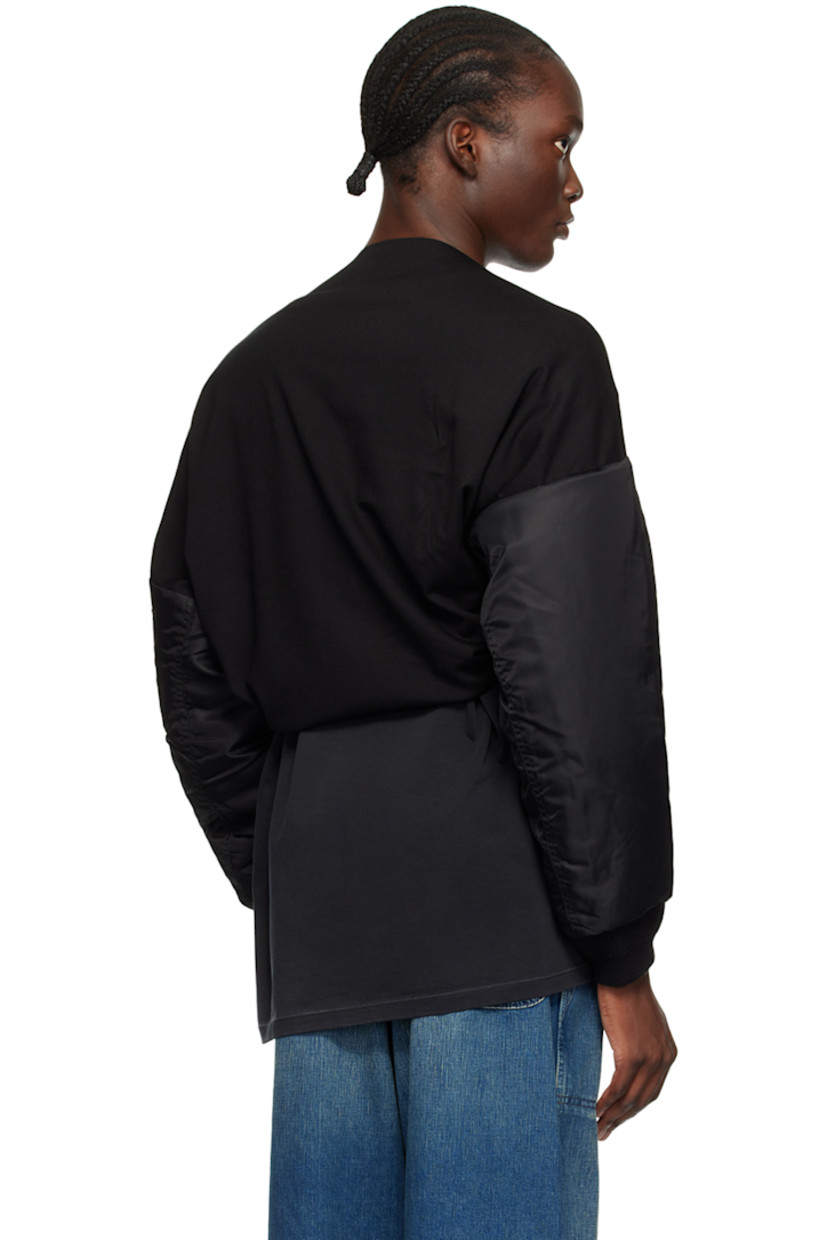 Insulated nylon satin bolero-style bomber jacket.

· Paneled construction
· Utility pocket at sleeve
· Rib knit cuffs
· Logo-engraved silver-tone hardware

Supplier color: Black