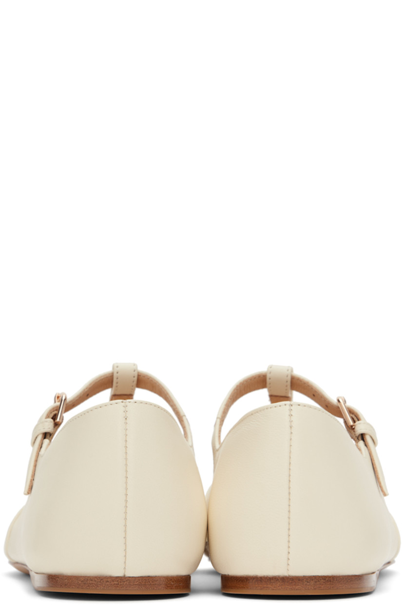 Nappa lambskin ballerina flats in off-white.

· Pointed toe
· Pin-buckle T-bar strap at vamp
· Nappa lambskin lining
· Calfskin sole with rubber injection

Supplier color: Cream