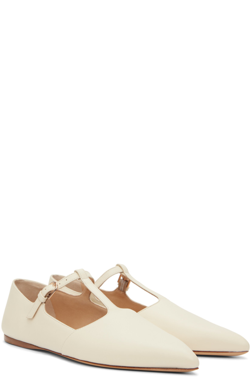 Nappa lambskin ballerina flats in off-white.

· Pointed toe
· Pin-buckle T-bar strap at vamp
· Nappa lambskin lining
· Calfskin sole with rubber injection

Supplier color: Cream