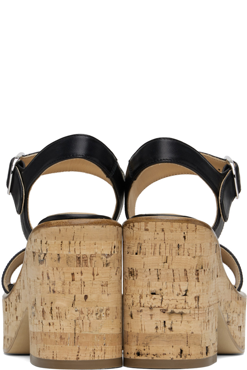 Buffed nappa calfskin heeled sandals in black.

· Open toe
· Pin-buckle ankle strap
· Logo patch at padded footbed
· Cork platform midsole
· Cork block heel
· Leather sole with rubber injection 
· Platform: H1.75" 
· Heel: H4.25"

Supplier color: Black