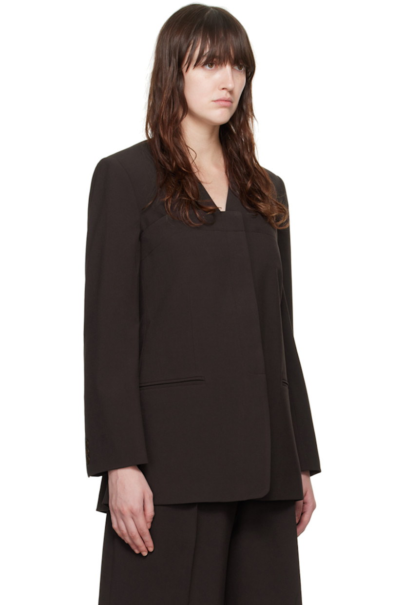 Stretch polyester- and viscose-blend barathea blazer. Detachable button panel for alternate styling. 

· V-neck
· Concealed button closure
· Welt pockets
· Three-button surgeon's cuffs
· Full cupro- and viscose-blend satin lining

Supplier color: Umber