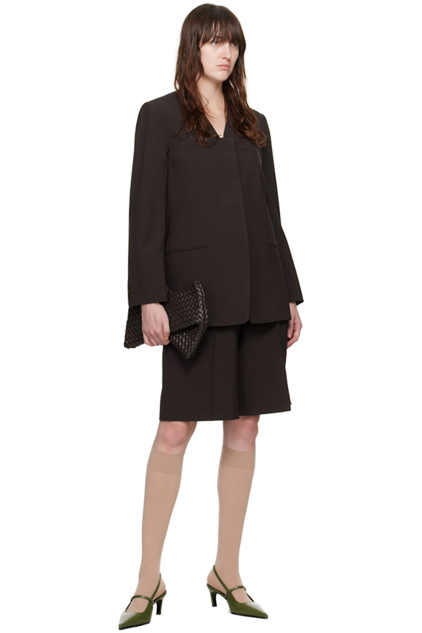 Stretch polyester- and viscose-blend barathea blazer. Detachable button panel for alternate styling. 

· V-neck
· Concealed button closure
· Welt pockets
· Three-button surgeon's cuffs
· Full cupro- and viscose-blend satin lining

Supplier color: Umber