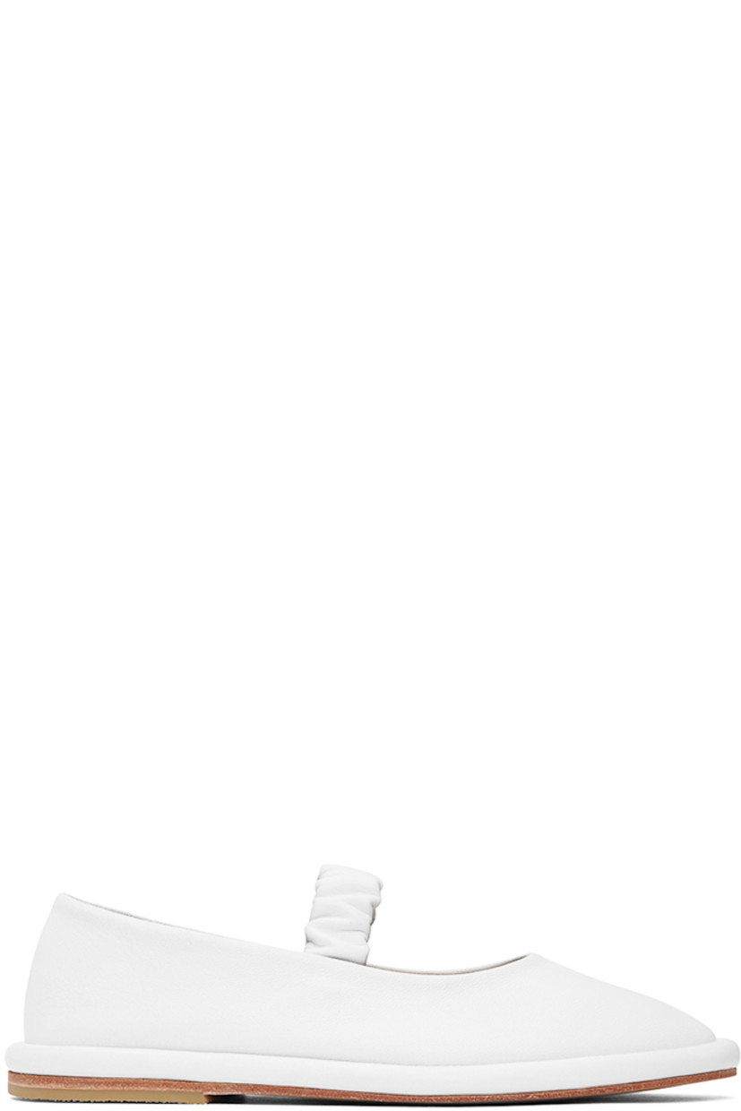 Handcrafted grained leather ballerina flats in white.

· Ruched elasticized strap at vamp
· Grained leather lining
· Covered midsole
· Crepe rubber heel
· Leather sole

Supplier color: White