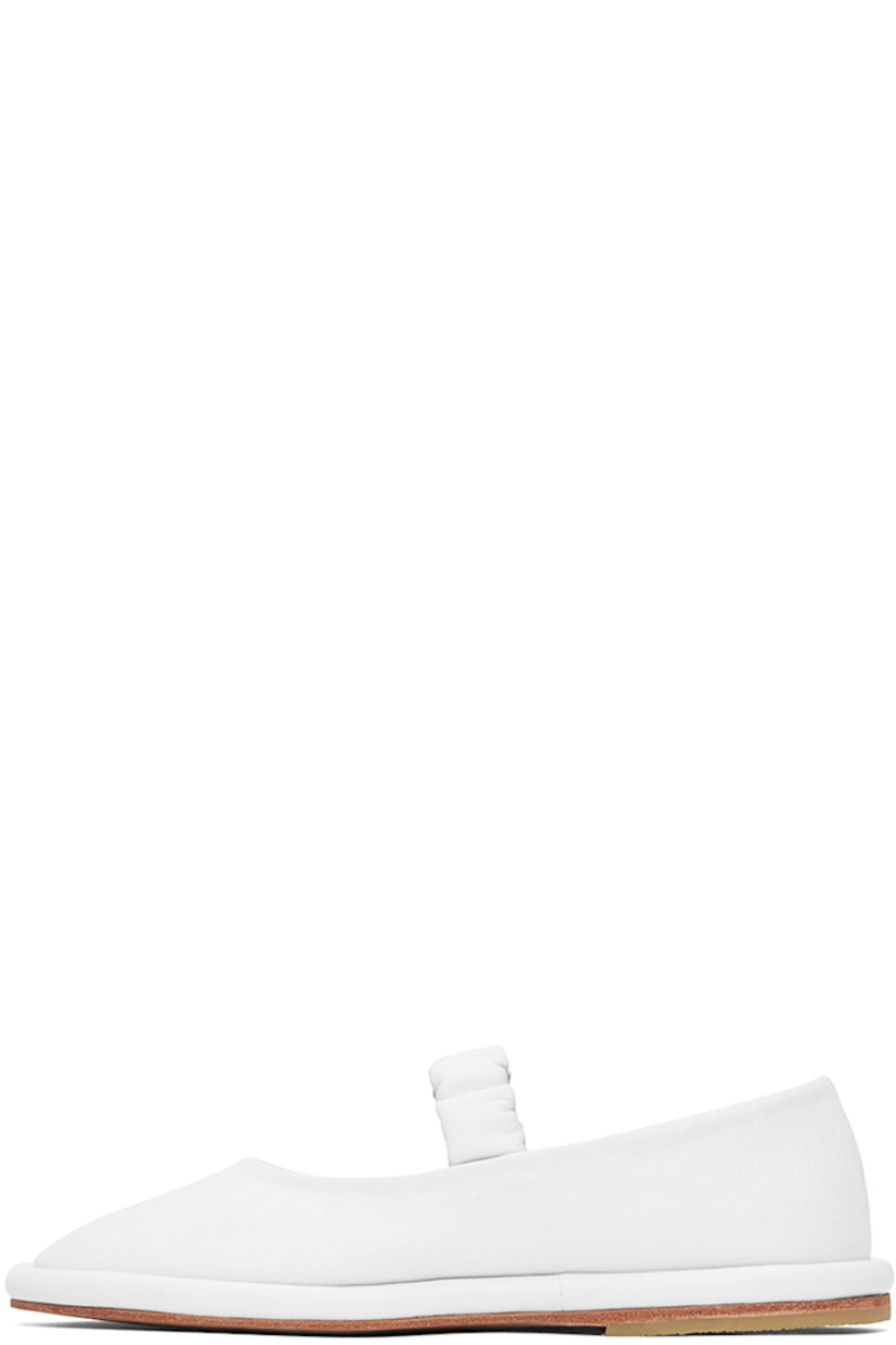 Handcrafted grained leather ballerina flats in white.

· Ruched elasticized strap at vamp
· Grained leather lining
· Covered midsole
· Crepe rubber heel
· Leather sole

Supplier color: White