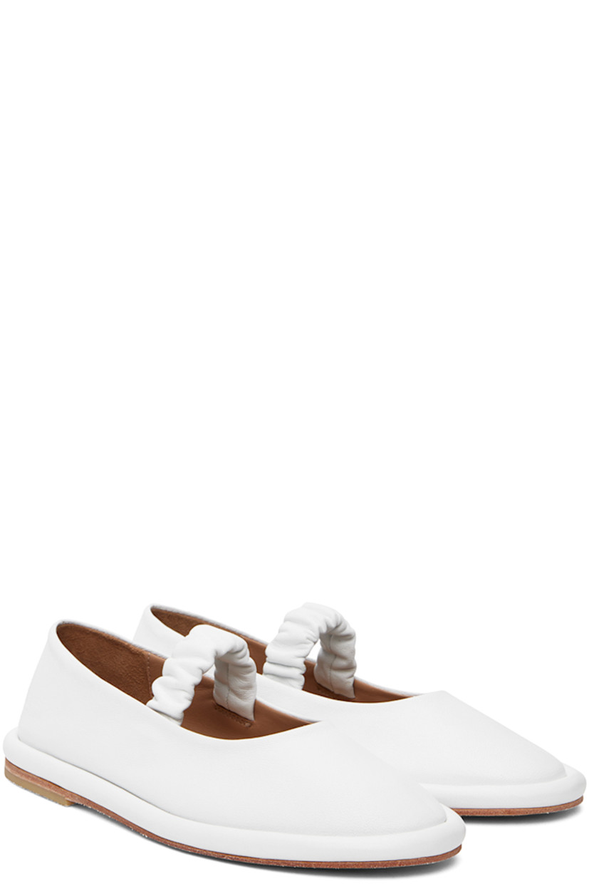 Handcrafted grained leather ballerina flats in white.

· Ruched elasticized strap at vamp
· Grained leather lining
· Covered midsole
· Crepe rubber heel
· Leather sole

Supplier color: White