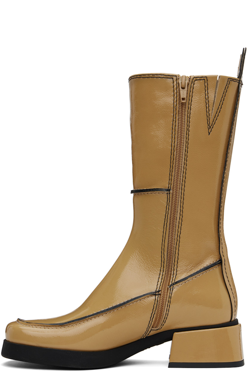 Handcrafted mid-calf grained patent leather boots in beige.

· Paneled construction 
· Inverted seams throughout
· Square moc toe
· Zip closure at inner side
· Concealed elasticized gusset at collar
· Pull-tab at heel collar
· Grained faux-leather lining
· Treaded rubber sole
· Contrast stitching in black
· Heel: H1.75"

Supplier color: Beige/Black