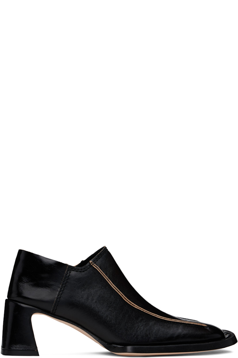 Polished sheepskin heels in black.

· Square toe
· Pinched seams at vamp
· Collapsible heel counter
· Padded leather insole
· Covered block heel with rubber injection
· Nubuck leather sole with rubber injection
· Heel: H2.25"

Supplier color: Black
