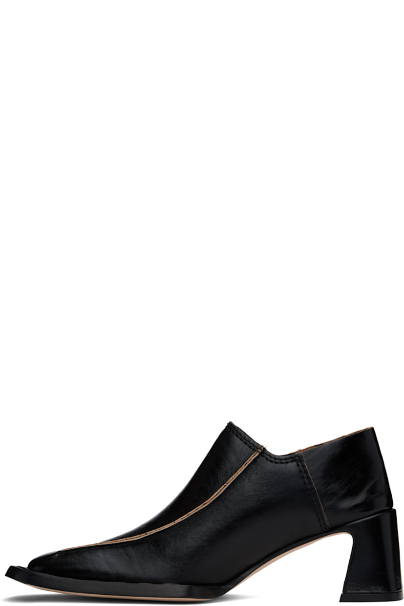 Polished sheepskin heels in black.

· Square toe
· Pinched seams at vamp
· Collapsible heel counter
· Padded leather insole
· Covered block heel with rubber injection
· Nubuck leather sole with rubber injection
· Heel: H2.25"

Supplier color: Black