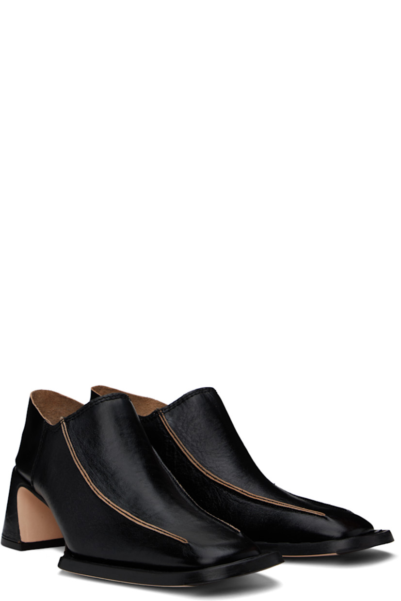 Polished sheepskin heels in black.

· Square toe
· Pinched seams at vamp
· Collapsible heel counter
· Padded leather insole
· Covered block heel with rubber injection
· Nubuck leather sole with rubber injection
· Heel: H2.25"

Supplier color: Black