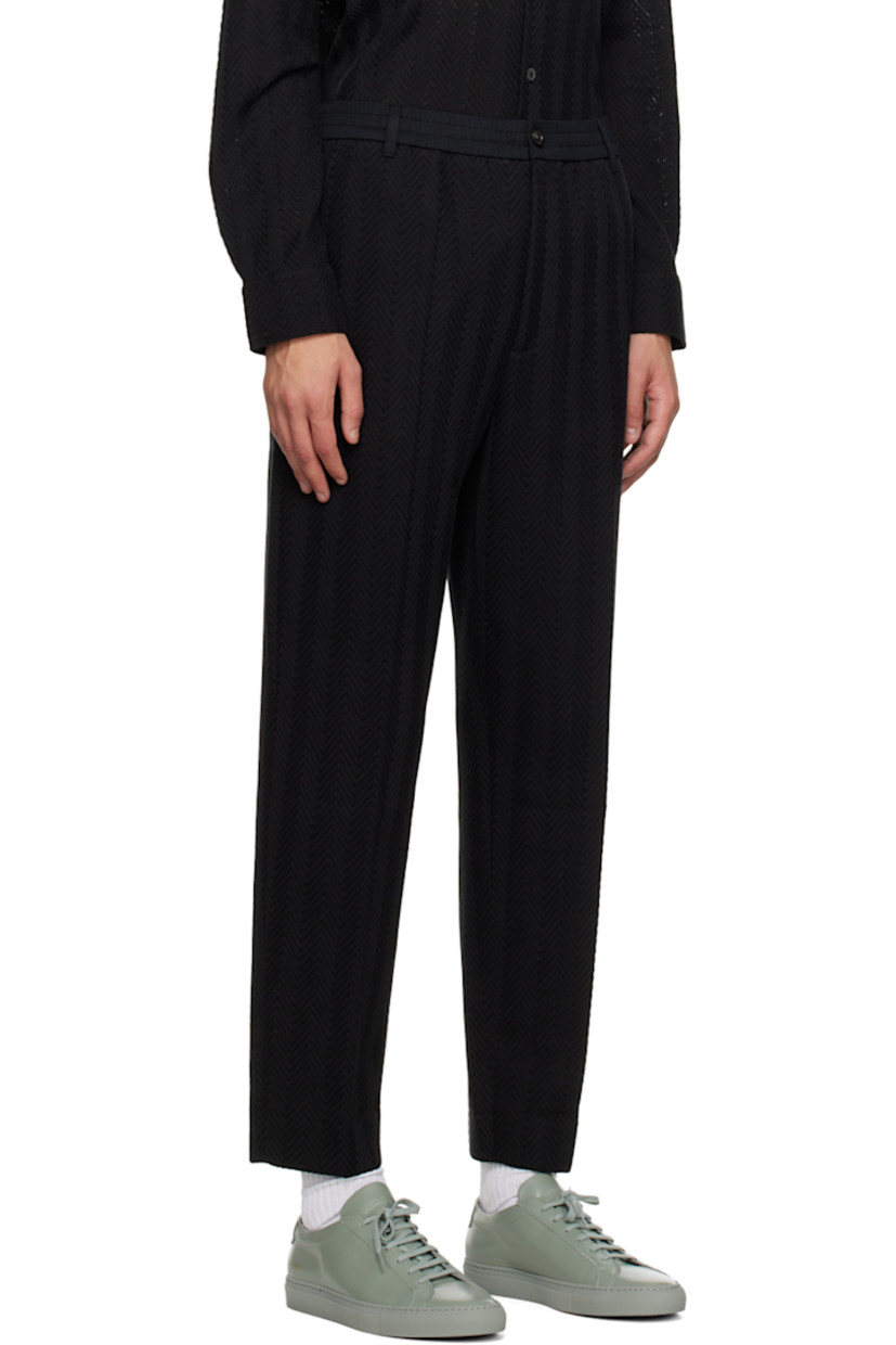 Knit cotton- and viscose-blend trousers. Herringbone pattern throughout.

· Belt loops
· Concealed drawstring at elasticized waistband
· Four-pocket styling
· Zip-fly
· Creased legs 

Supplier color: Black beauty