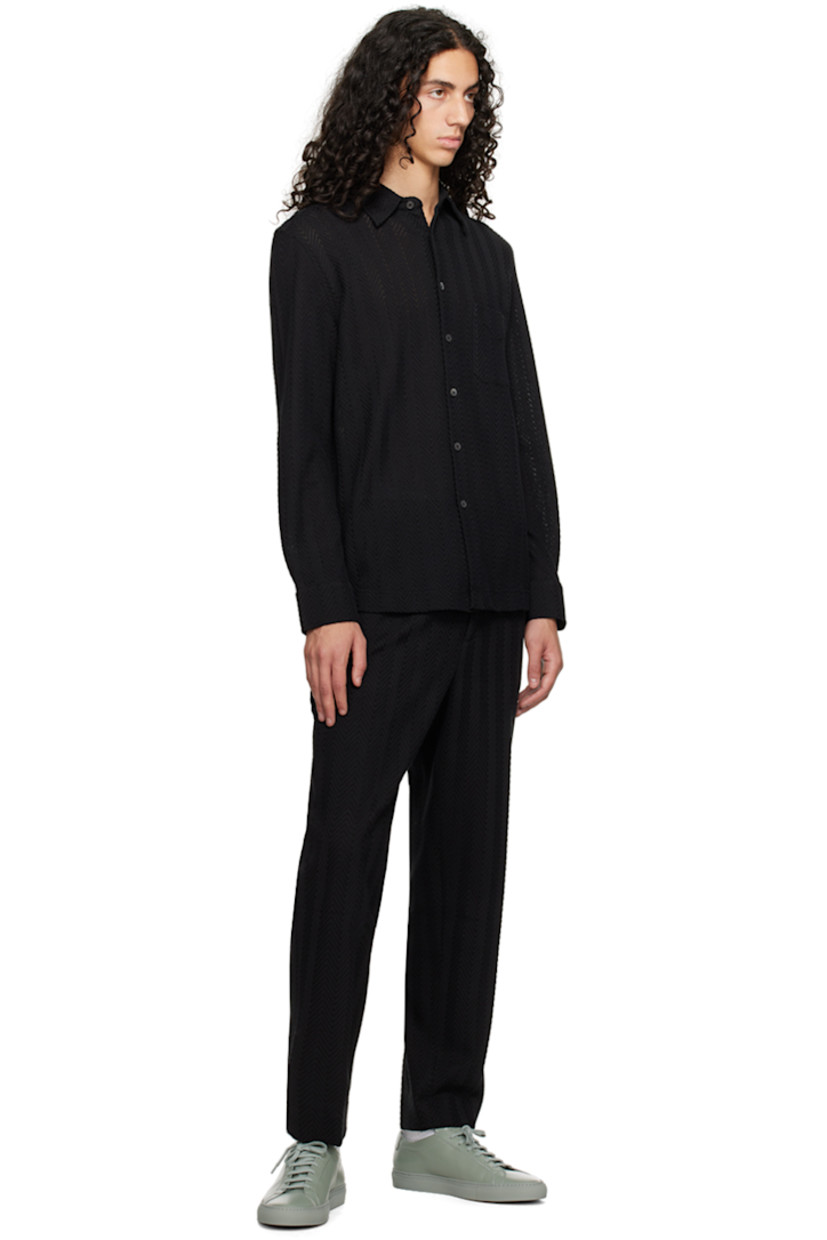 Knit cotton- and viscose-blend trousers. Herringbone pattern throughout.

· Belt loops
· Concealed drawstring at elasticized waistband
· Four-pocket styling
· Zip-fly
· Creased legs 

Supplier color: Black beauty