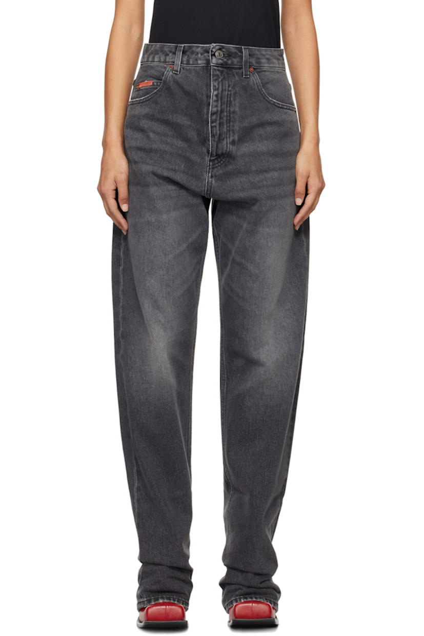 Non-stretch denim jeans. Fading and whiskering throughout. 

· Belt loops
· Five-pocket styling
· Zip hardware at button-fly for alternate styling
· Logo patch at coin pocket
· Logo patch at back waistband
· Logo-engraved silver-tone hardware

Supplier color: Black washed