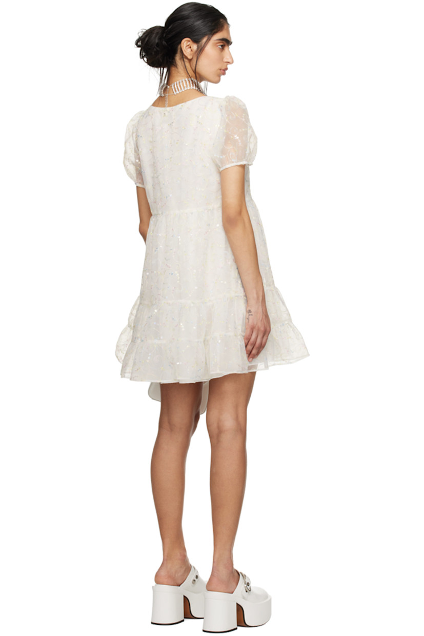 Semi-sheer polyester organza dress. Gathering, sequins, and graphic metallic thread detailing throughout.

· Tiered construction
· Scoop neck
· Puff sleeves 
· Full crepe lining 

Part of the exclusive SSENSE Bridal capsule.

Supplier color: Cream multi