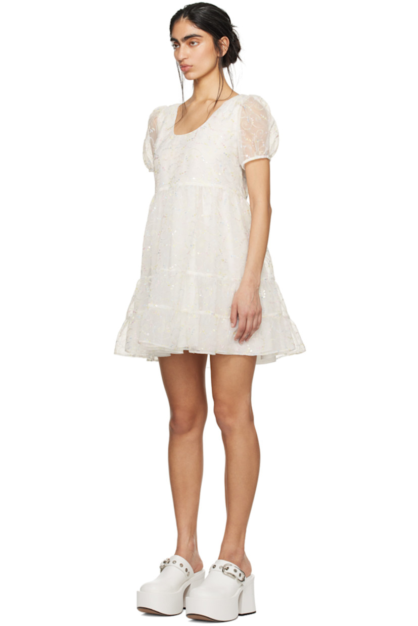 Semi-sheer polyester organza dress. Gathering, sequins, and graphic metallic thread detailing throughout.

· Tiered construction
· Scoop neck
· Puff sleeves 
· Full crepe lining 

Part of the exclusive SSENSE Bridal capsule.

Supplier color: Cream multi