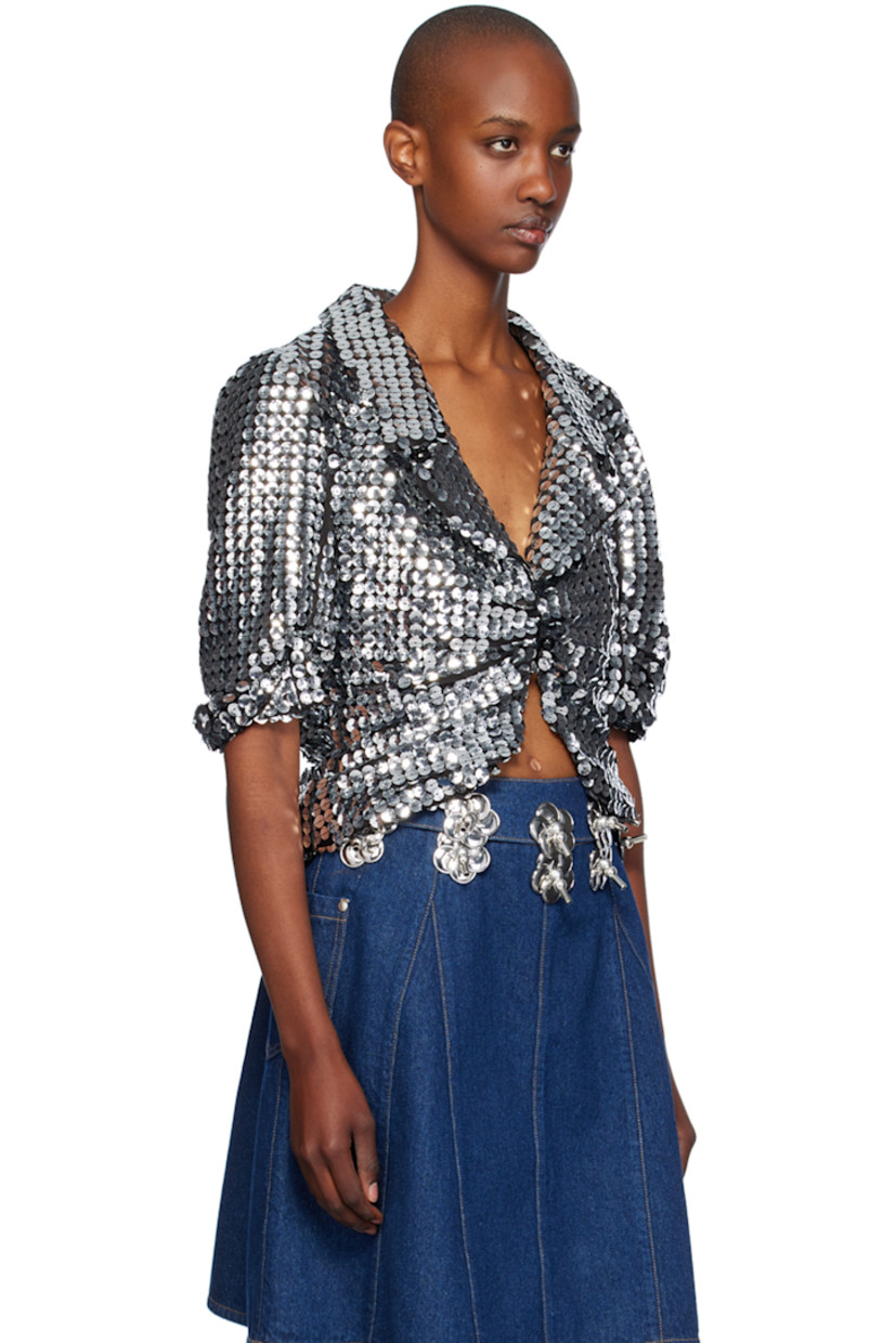 Sequinned stretch polyester mesh jacket.

· Notched lapel
· Single-button fastening at open front 
· Cropped hem
· Full mesh lining 

Supplier color: Silver multi