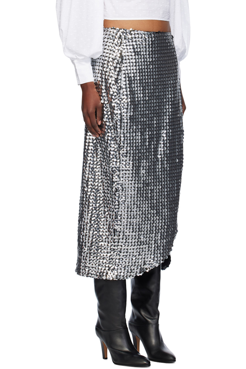 Sequinned stretch polyester mesh midi skirt.

· Zip closure at waistband 
· Vent at front hem
· Full mesh lining 

Supplier color: Silver multi