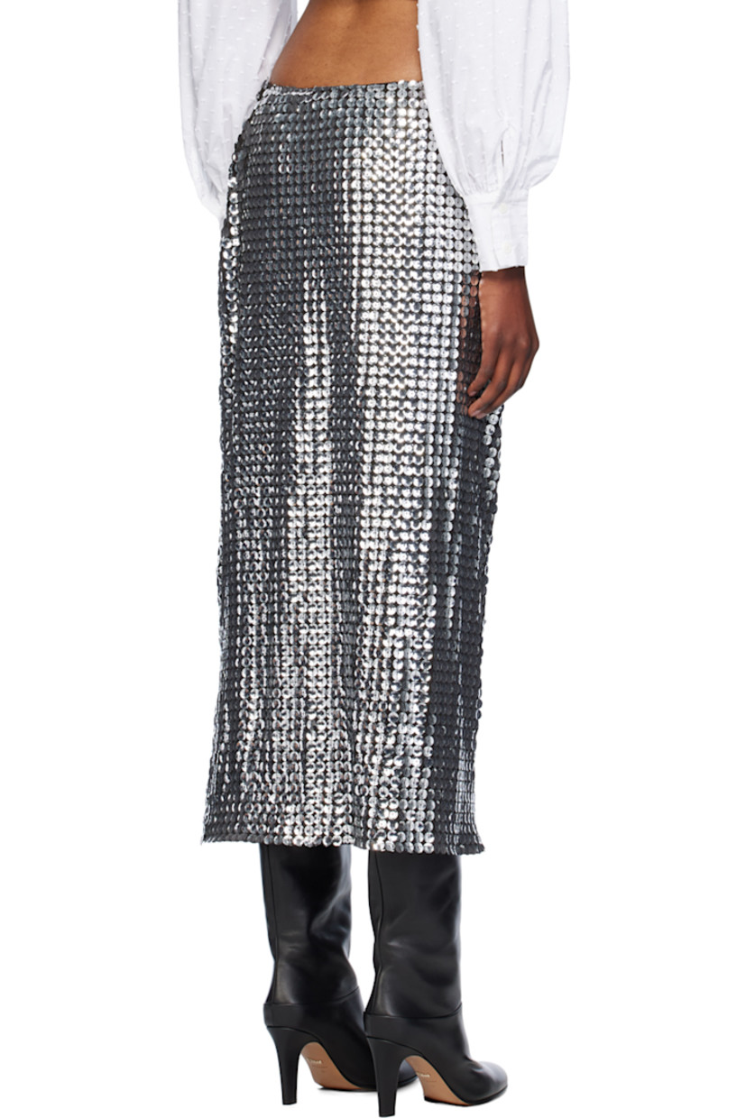 Sequinned stretch polyester mesh midi skirt.

· Zip closure at waistband 
· Vent at front hem
· Full mesh lining 

Supplier color: Silver multi