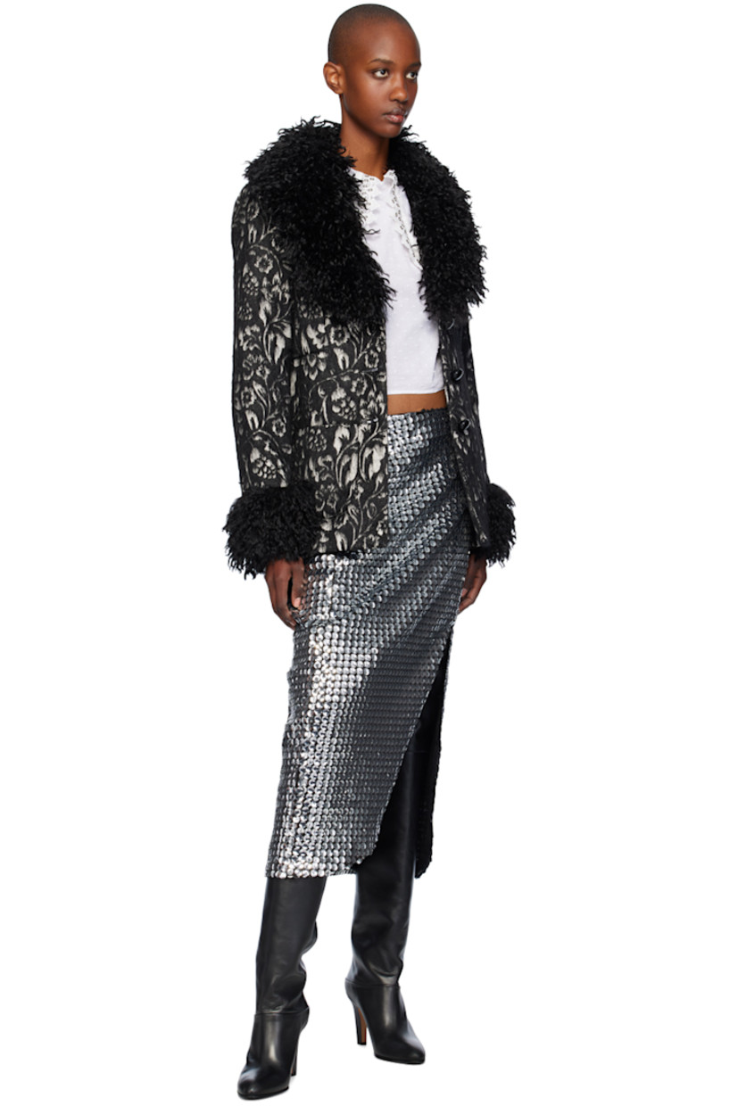 Sequinned stretch polyester mesh midi skirt.

· Zip closure at waistband 
· Vent at front hem
· Full mesh lining 

Supplier color: Silver multi