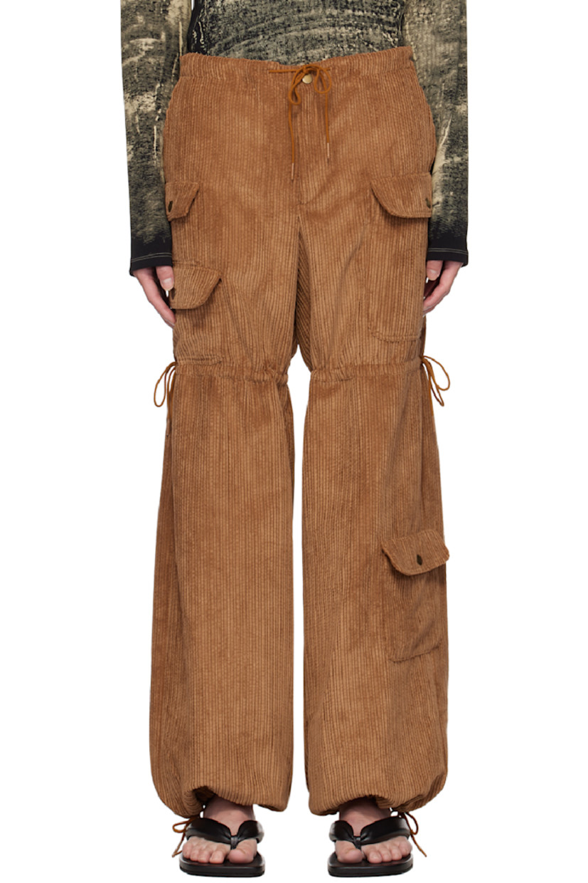 Polyester- and nylon-blend corduroy cargo pants.

· Drawstring at waistband, legs, and cuffs
· Four-pocket styling
· Zip-fly
· Flap pockets at legs

Available exclusively at SSENSE.

Supplier color: Cinnamon