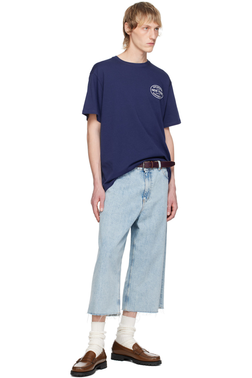 Cotton jersey T-shirt.

· Rib knit crewneck
· Logo and text printed at chest and back

Supplier color: Ocean