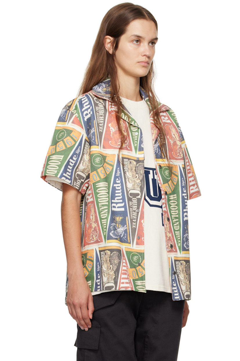 Brushed cotton twill shirt. Logo graphic pattern printed throughout.

· Open spread collar
· Press-stud closure
· Vented side seams
· Logo-engraved silver-tone hardware

Supplier color: Multi