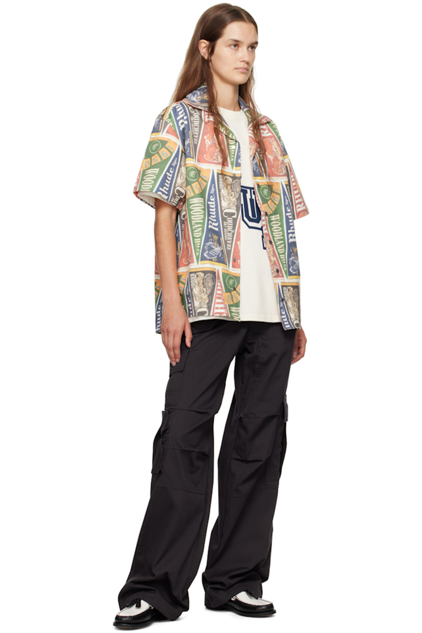 Brushed cotton twill shirt. Logo graphic pattern printed throughout.

· Open spread collar
· Press-stud closure
· Vented side seams
· Logo-engraved silver-tone hardware

Supplier color: Multi