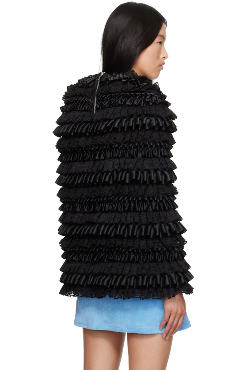 Cotton-blend jersey cape-style jacket. Satin and lace ruffled trim throughout.

· Crewneck
· Zip closure at back collar

Supplier color: Black
