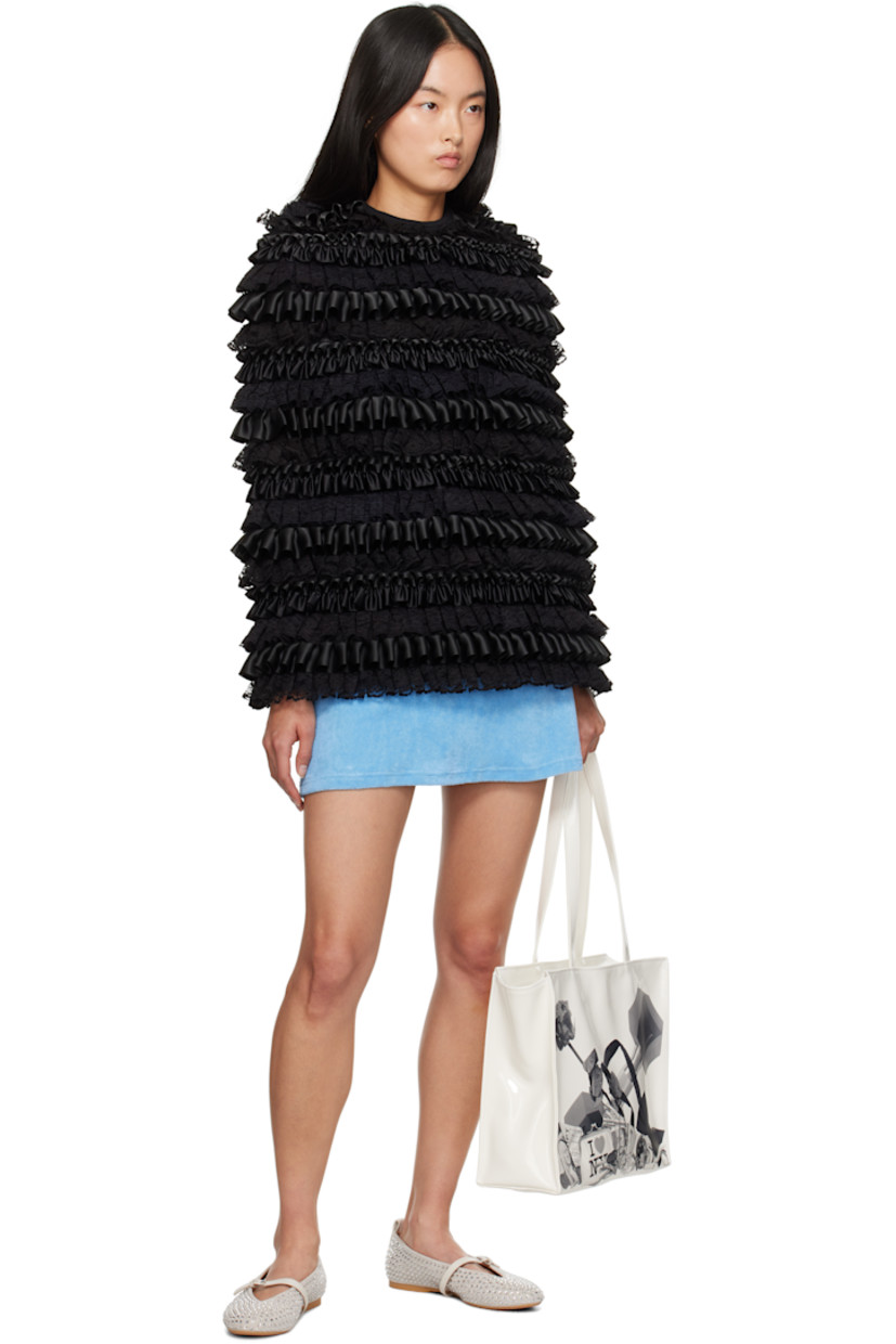Cotton-blend jersey cape-style jacket. Satin and lace ruffled trim throughout.

· Crewneck
· Zip closure at back collar

Supplier color: Black