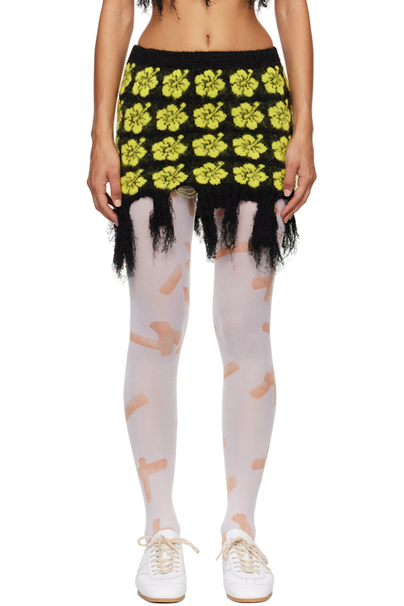 Knit stretch cotton-blend bouclé skirt. Jacquard floral pattern throughout.

· Elasticized waistband
· Rib knit trim at waist and hem
· Frayed edge at asymmetric hem

Supplier color: Yellow