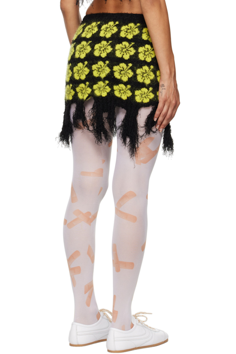 Knit stretch cotton-blend bouclé skirt. Jacquard floral pattern throughout.

· Elasticized waistband
· Rib knit trim at waist and hem
· Frayed edge at asymmetric hem

Supplier color: Yellow