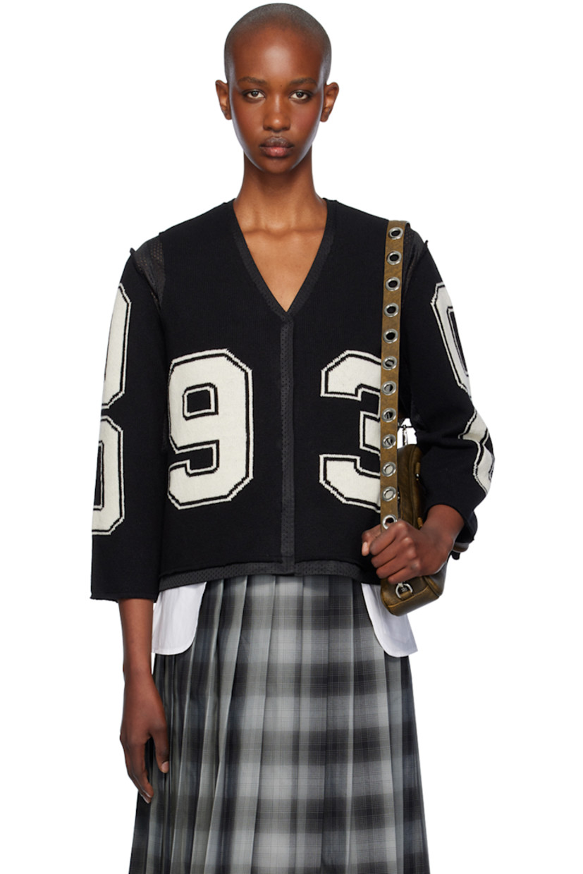 Knit merino lambswool and polyester mesh cardigan. Raw edges and intarsia text throughout.

· Paneled construction
· Y-neck
· Press-stud closure
· Full mesh lining

Supplier color: Black