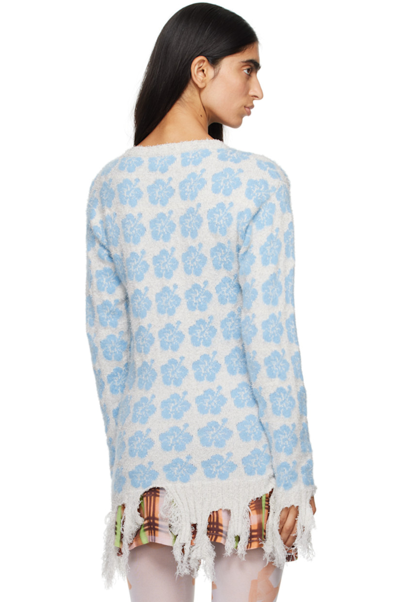 Knit stretch cotton-blend bouclé sweater. Jacquard floral pattern throughout.

· Rib knit collar, hem, and cuffs
· Frayed edge at hem and cuffs

Supplier color: Blue