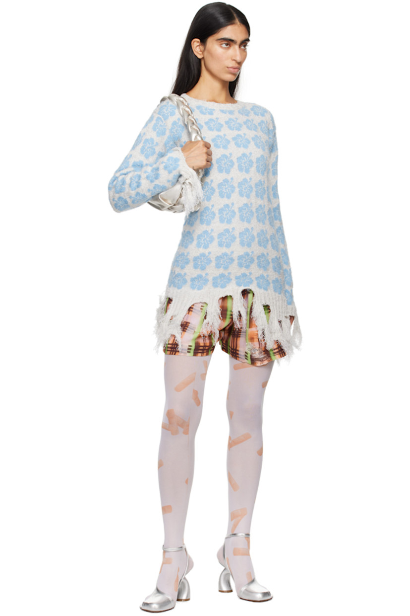 Knit stretch cotton-blend bouclé sweater. Jacquard floral pattern throughout.

· Rib knit collar, hem, and cuffs
· Frayed edge at hem and cuffs

Supplier color: Blue