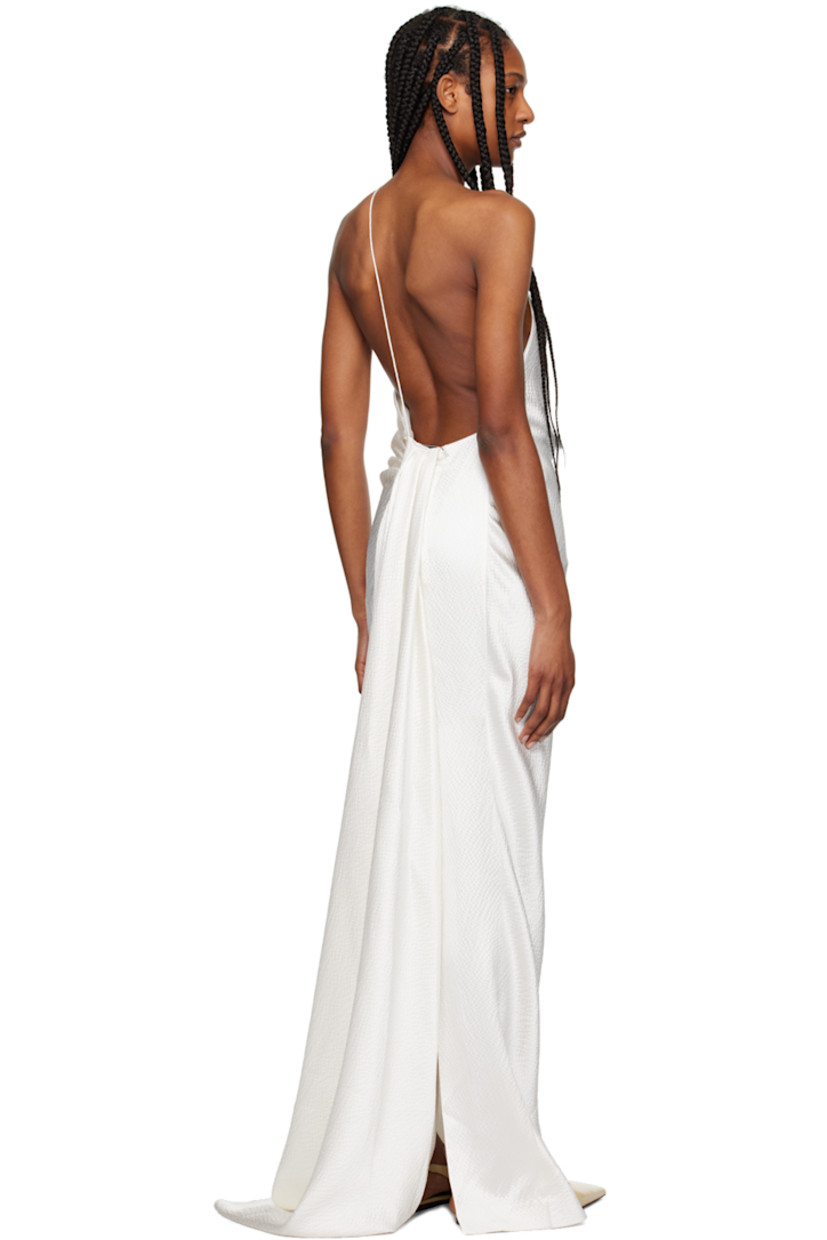 Silk seersucker dress. Draping throughout.

· Single-shoulder construction
· Spaghetti strap at open back
· Zip closure and extended trim at back 
· Central vent at back hem
· Full silk voile lining

Supplier color: White
