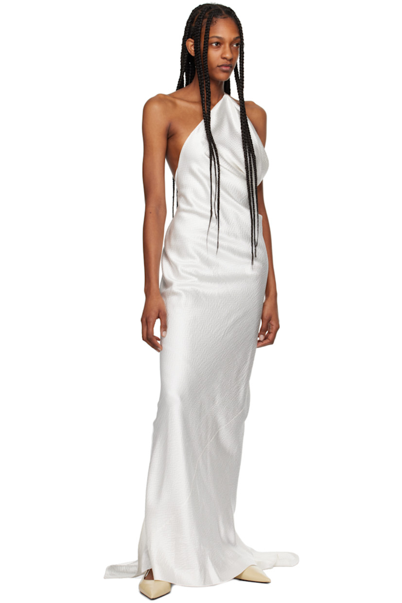 Silk seersucker dress. Draping throughout.

· Single-shoulder construction
· Spaghetti strap at open back
· Zip closure and extended trim at back 
· Central vent at back hem
· Full silk voile lining

Supplier color: White