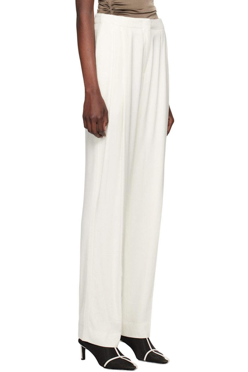 Tapered viscose- and virgin wool-blend twill trousers. 

· High rise 
· Four-pocket styling 
· Zip-fly 
· Pleats at front
· Creased legs 
· Full FSC-certified- and ecovero viscose-blend satin lining 

Supplier color: White